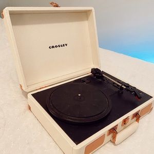 crosley record player with beige and rose gold detailing